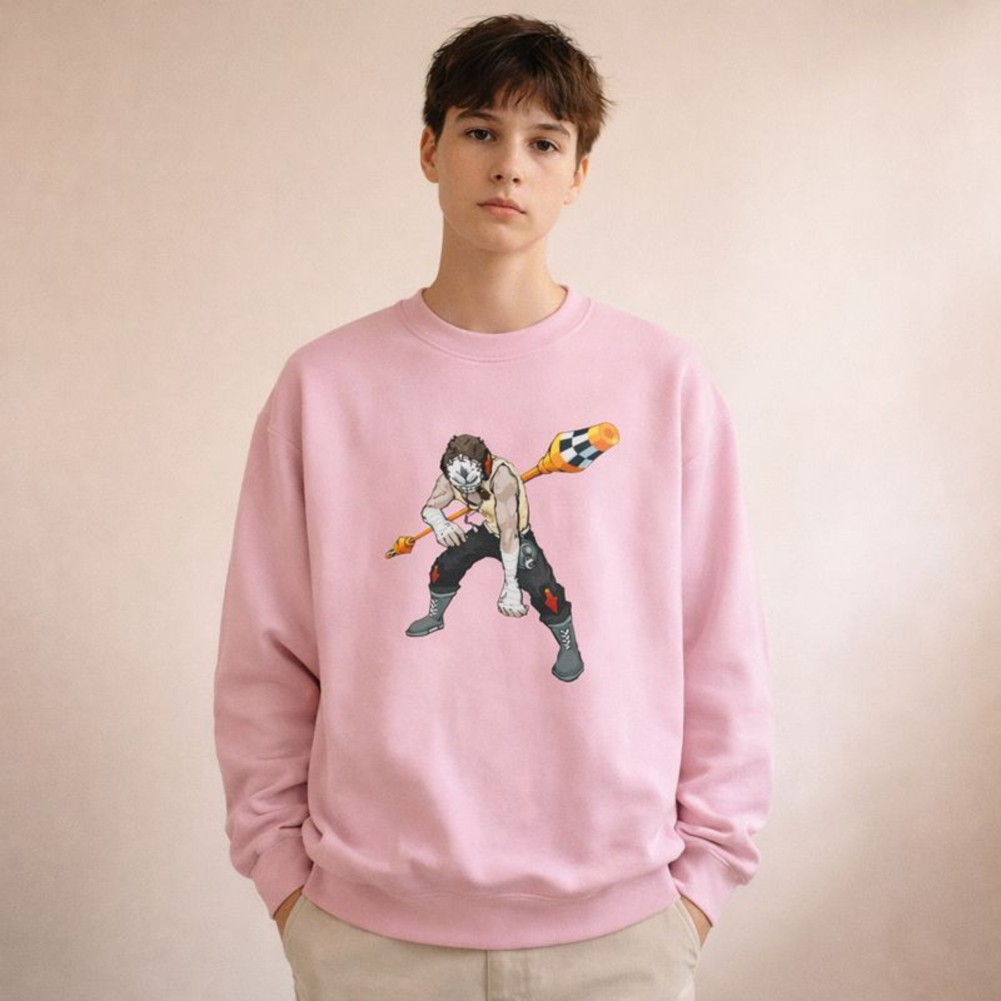 Harlequin jester graphic sweatshirt on model, pink unisex crewneck with hand-drawn streetwear illustration.