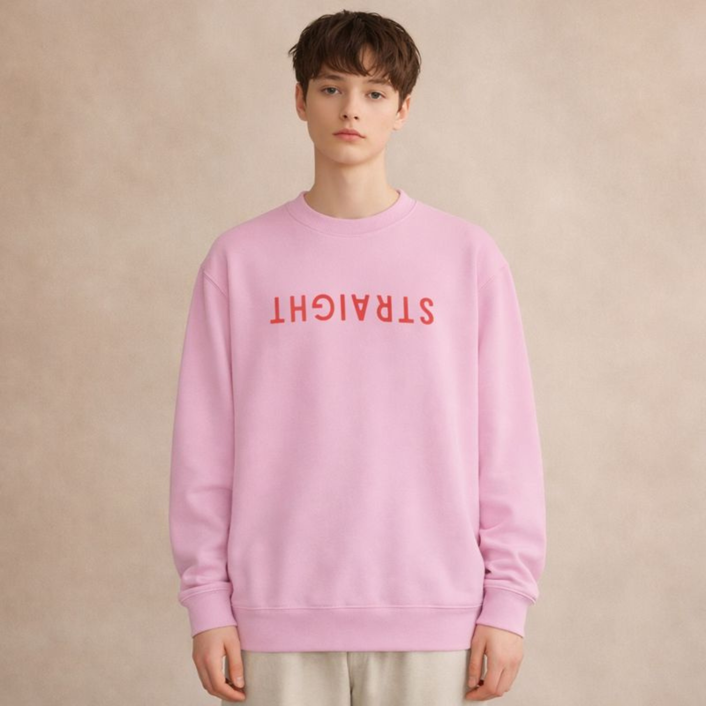 Pink unisex crewneck sweatshirt with upside-down STRAIGHT typography print, minimalist streetwear style.