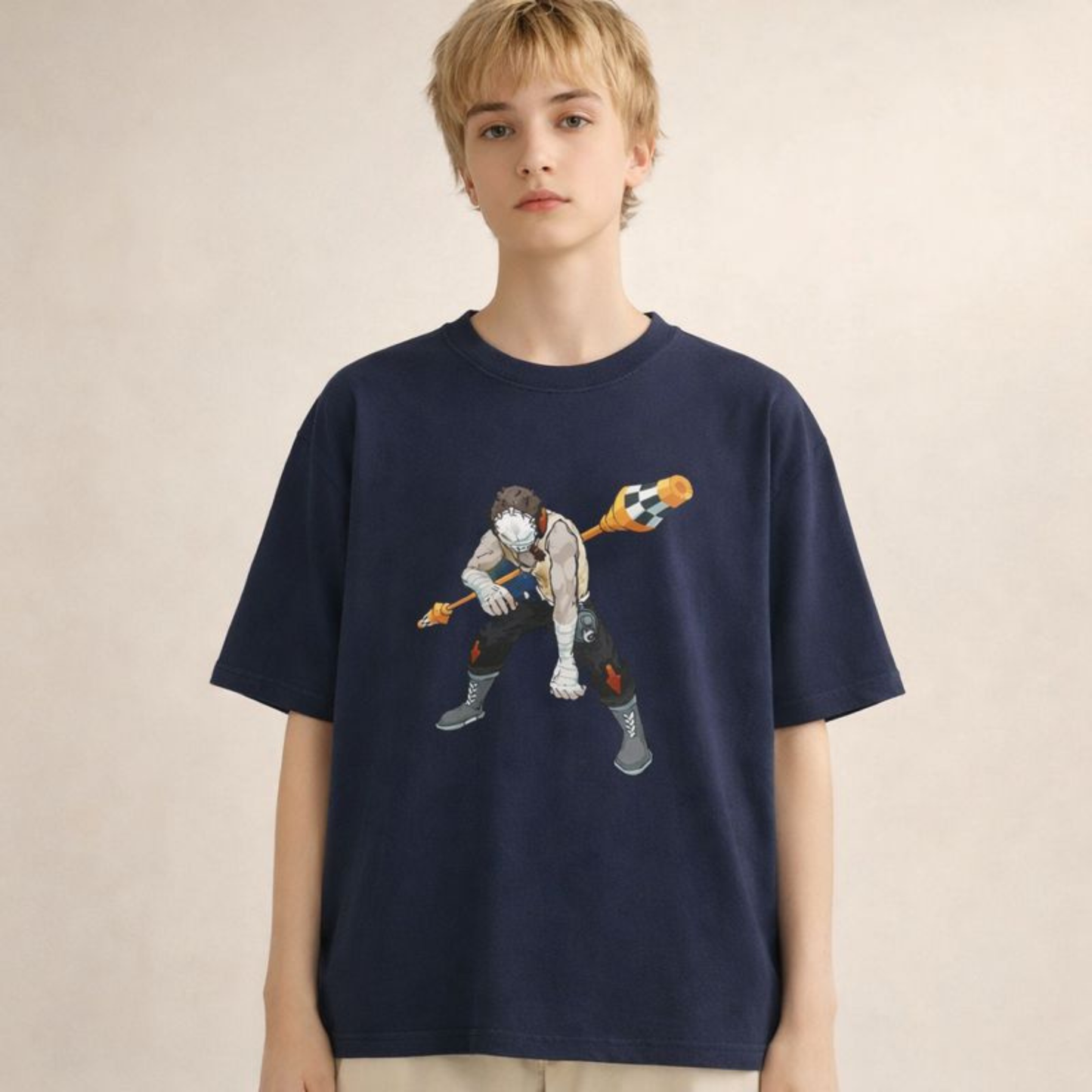 Oversized navy streetwear t-shirt with illustrated comic style character graphic, worn by unisex model in clean studio setting