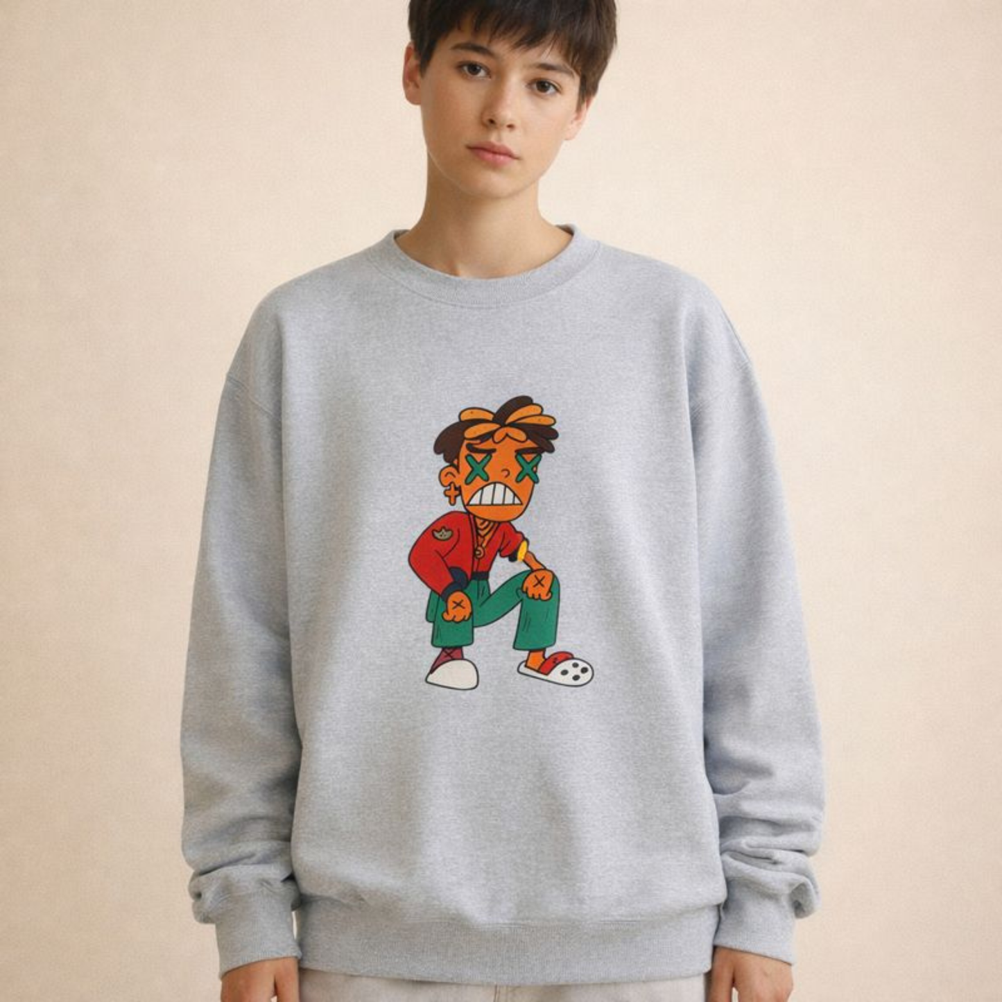 Grey heather unisex sweatshirt showcasing a playful cartoon character artwork, photographed in studio light.