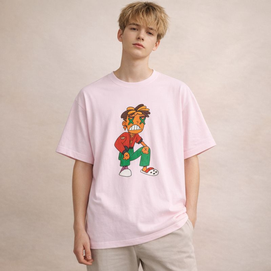 Unisex oversized pink t-shirt featuring a bold cartoon character print, worn by androgynous model in neutral studio setting